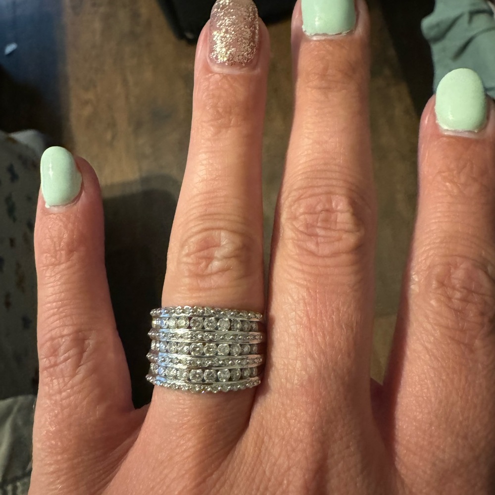 Genuine diamond multi-row anniversary band in 10k white gold. Size 6.25.